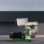 Peanut shell pellet mill machine on cement floor for biomass pellet production